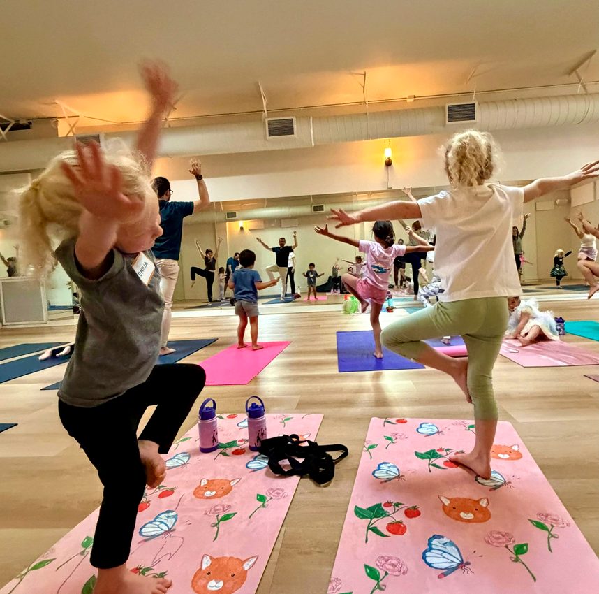 Kids practicing tree pose together